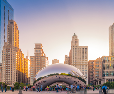 Chicago, Illinois - June 15, 2016: Evening view of Cloud Gate, a famous giant sculpture at Millennium park in Chicago's \