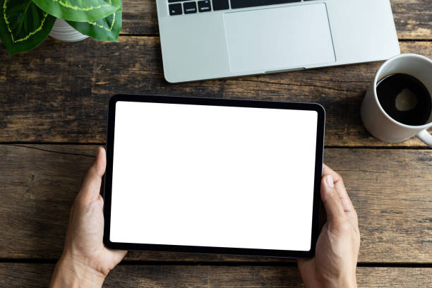 istock Mockup image tablet, man hand holding tablet pc with blank white screen 1280913000