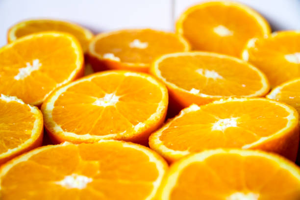 istock Bunch of fresh sliced oranges on a tray 1280917753