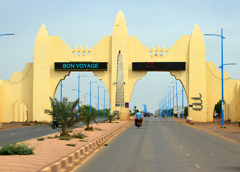 Bamako, Mali: Bamako city gates on the airport road - Neo-Sudanic Architecture - inspired in the adobe buildings of the Sahel region, in particular in the Great Mosque of Djenne. The three crocodiles are the symbol of the city, Bamako comes from the Bambara word meaning 'crocodile tail'.