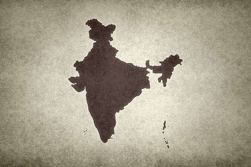 Grunge map of India with its flag printed within its border on an old paper.