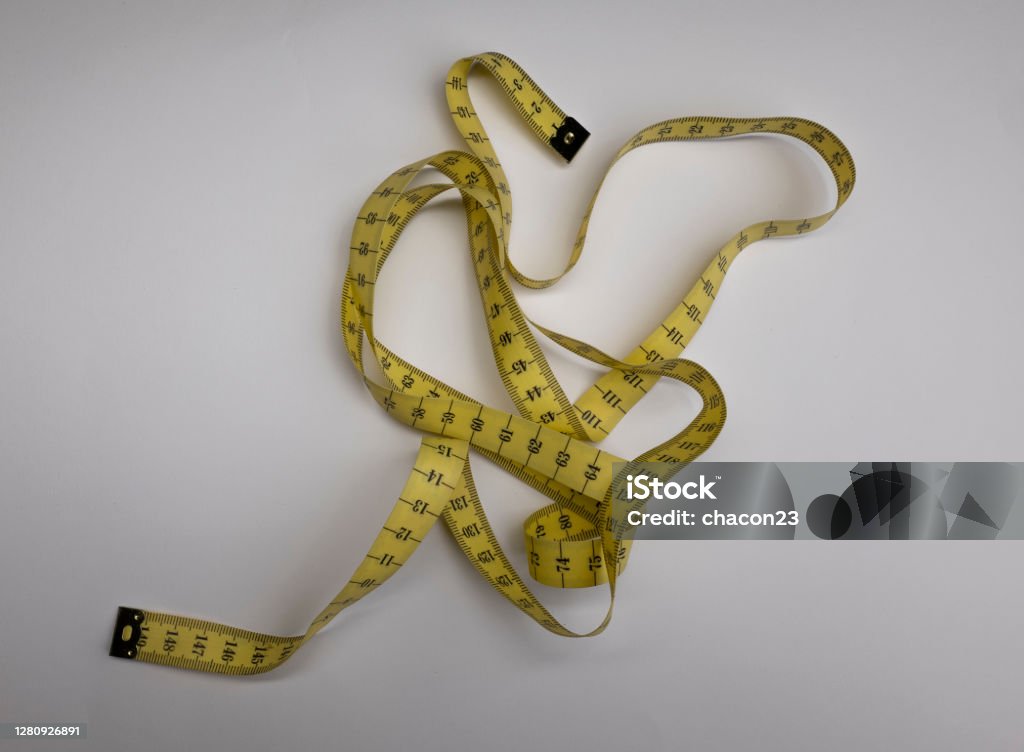 Sewing kit measuring tape on white background Button - Sewing Item Stock Photo