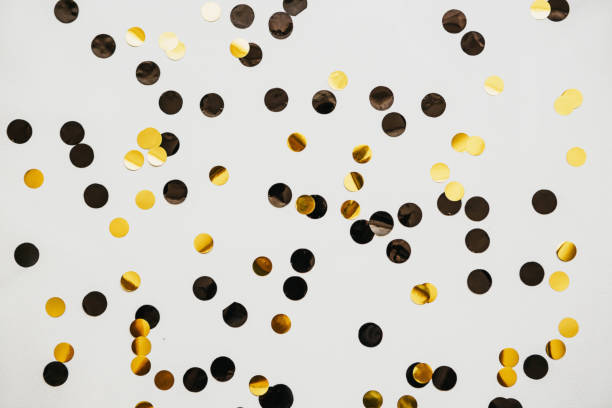 istock Scattered golden confetti background 1280930442