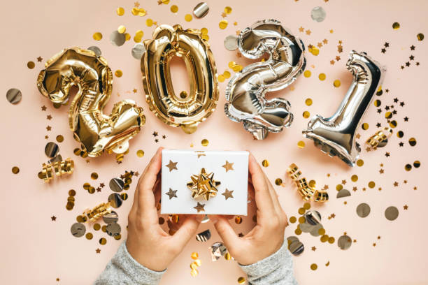 istock The girl holds a box with a gift 1280931271