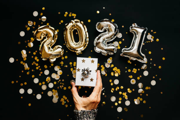 istock The person holds a box with a gift 1280931283
