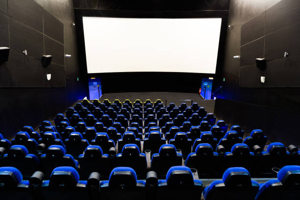 istock Cinema theater interior with screen and blue seats 1280931329