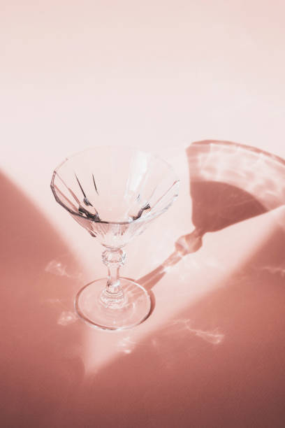 istock Wine glass on a pink background 1280932797