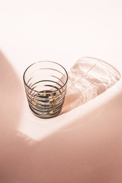 istock Glass on a pink background 1280933315