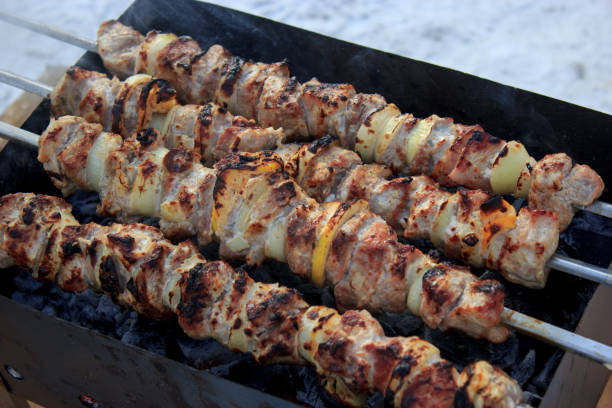 istock Charcoal barbecue with lemon. Saslik. Shashlik 1280936677