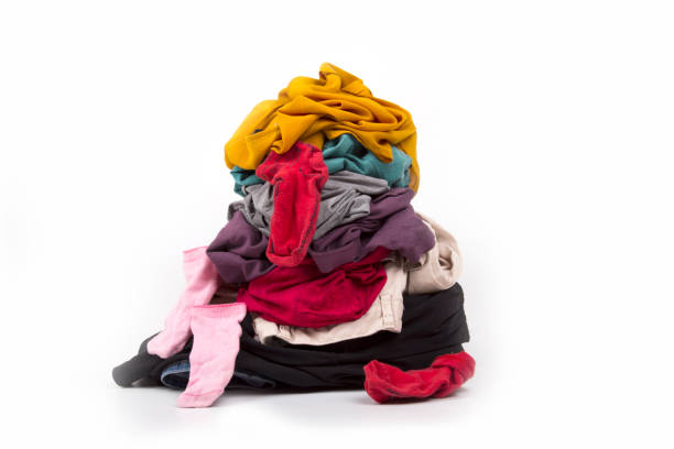 dirty laundry waiting to be washed, on a white background
