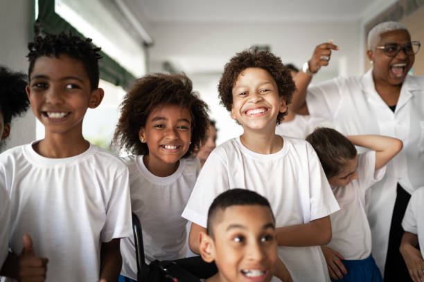 istock Portrait of  a happy group of elementary students 1280937042