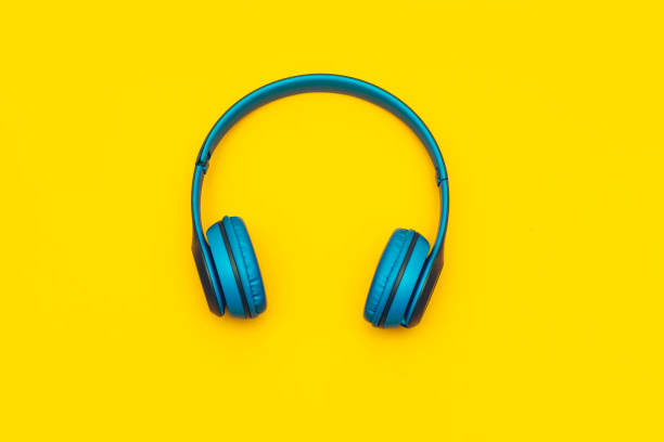 istock Wireless Headphone Or Earphone on yellow background 1280943898