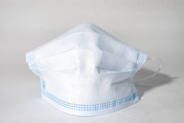 istock Medical mask on white background, disposable face mask for coronavirus protection 1280945556
