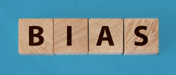istock the word bias on wooden blocks blue background 1280945636
