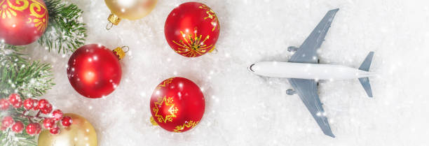 istock Travel for Christmas. Airplane with Christmas decor. Selective focus. 1280946274