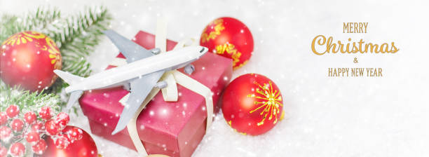 istock Travel for Christmas. Airplane with Christmas decor. Selective focus. 1280946276