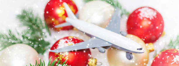 istock Travel for Christmas. Airplane with Christmas decor. Selective focus. 1280946293