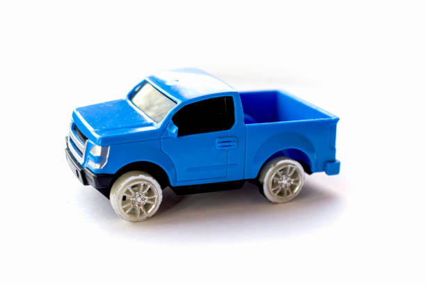 girl in toy car