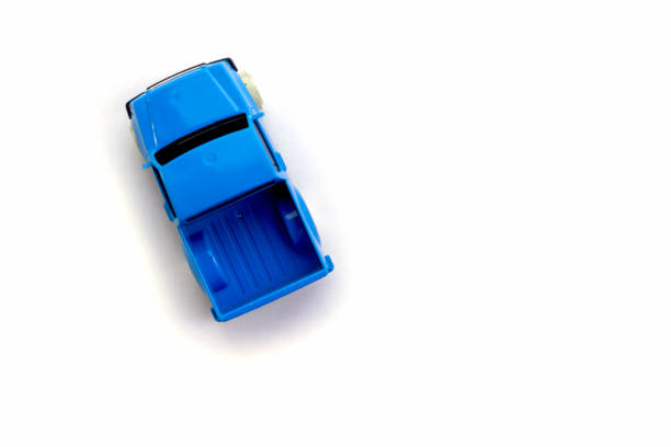 istock Children s toy little blue car on a white background. Copy space for text 1280949131