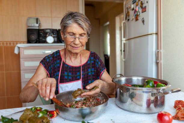 Senior woman preparing for various stuffed