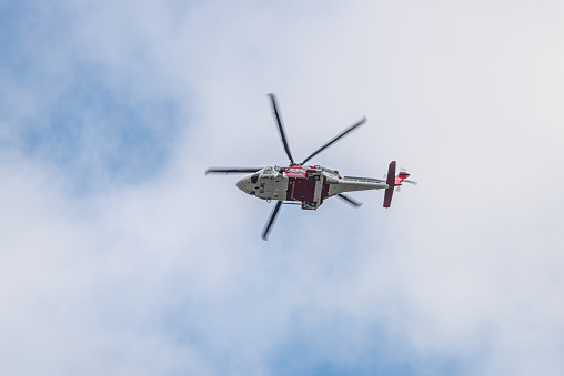 Gothenburg, Sweden - October 03 2020: Search and rescue helicopter SE-JRL AgustaWestland AW139 on a mission.