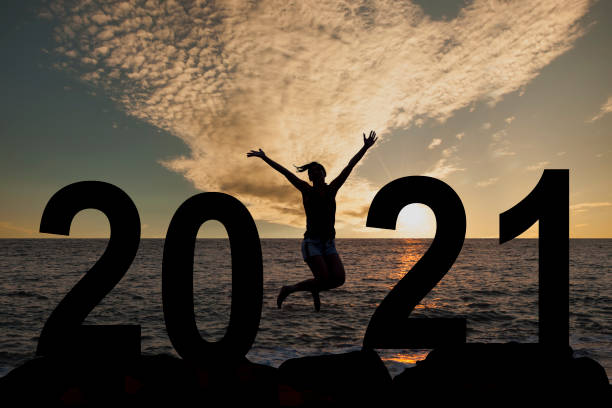 Silhouette young woman happy for 2020 new year