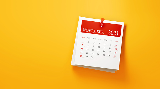2021 post it November calendar on yellow background. Horizontal composition with copy space. Calendar and reminder concept.
