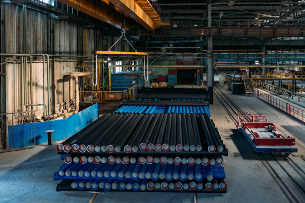 istock New cast iron pipes for pipeline construction in warehouse 1280956472