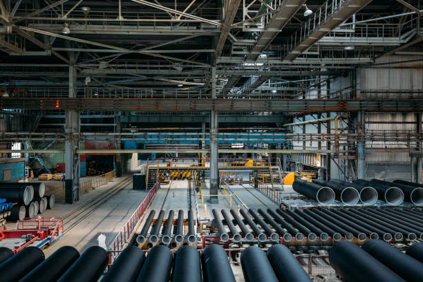 istock New cast iron pipes for pipeline construction in warehouse 1280956488
