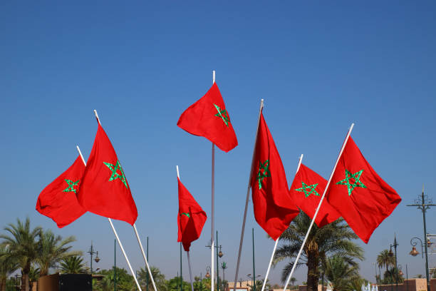 istock Morocco national flags waving in the wind 1280957270