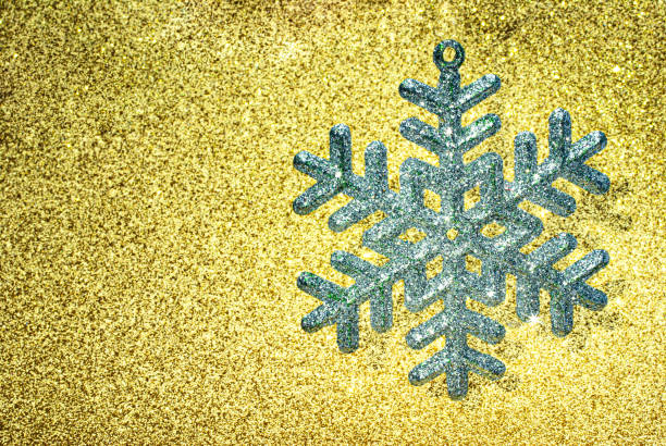 istock Christmas tree toy-snowflake on a shiny background. 1280957361