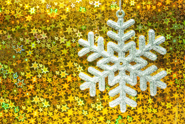 istock Christmas tree toy-snowflake on a shiny background. 1280957391