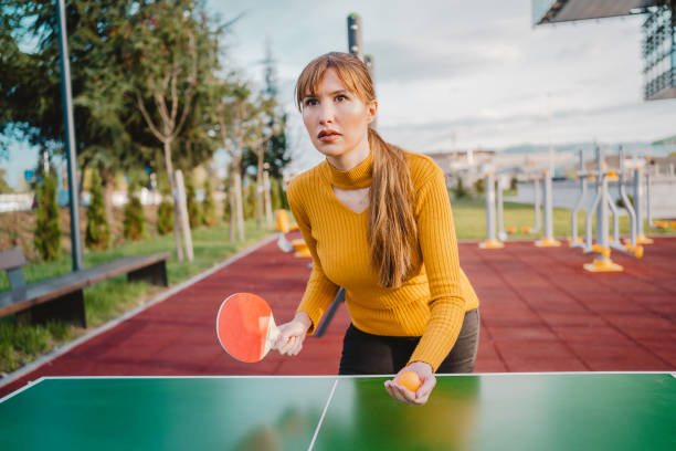 istock Woman playing table tennis game 1280959258