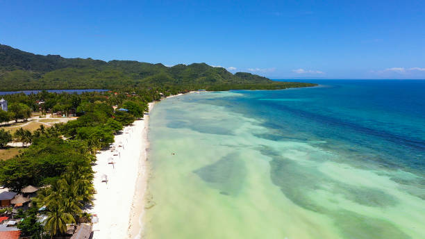 istock Coast with a beach and blue sea. Anda Bohol, Philippines 1280959329