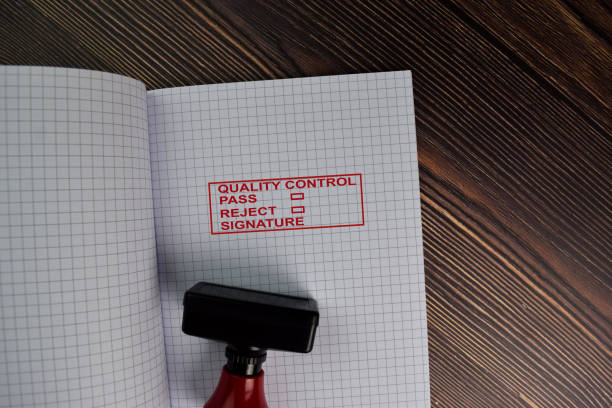 istock Red Handle Rubber Stamper and Quality Control, Pass, Reject and Signature text isolated on the table. 1280960119