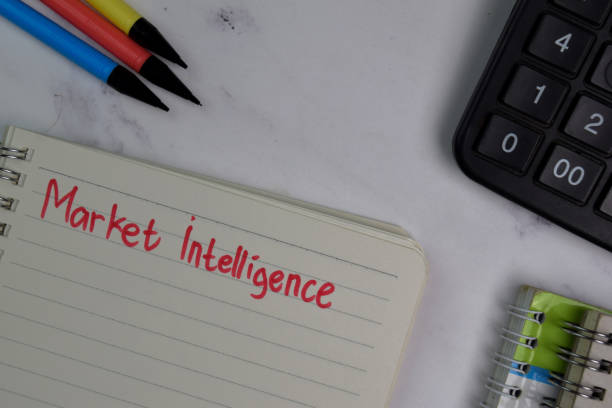 istock Market Intelligence write on a book isolated on office desk. 1280960198