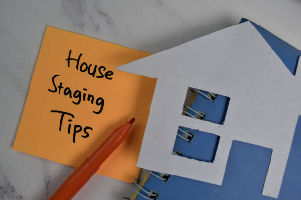 House Staging Tips write on sticky notes isolated on office desk. House Staging Tips write on sticky notes isolated on office desk. coupling stock pictures, royalty-free photos & images