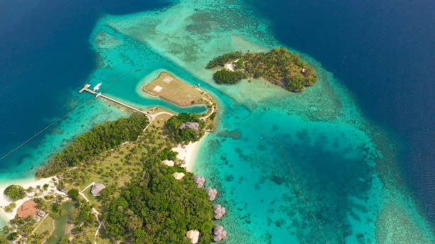 istock Tropical island with beach. Malipano island, Philippines, Samal 1280960978