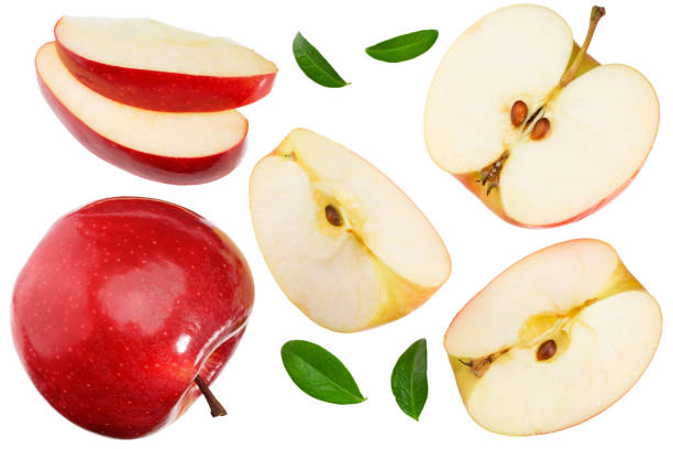 istock red apples with slices and green leaves isolated on a white background. top view 1280961780