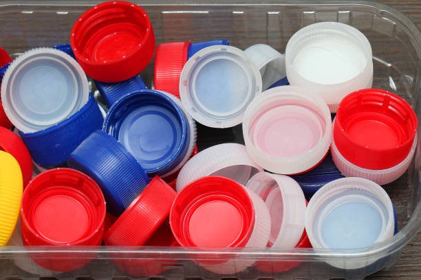 istock Pile of plastic bottle caps 1280961892