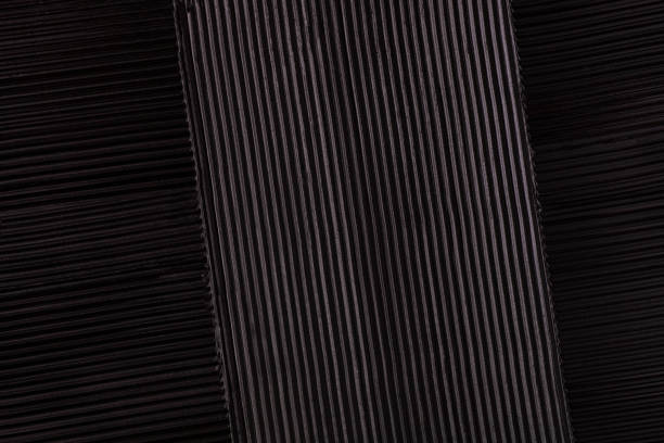 istock Dark pitch black mascara textured strokes close up with black colored background 1280963832