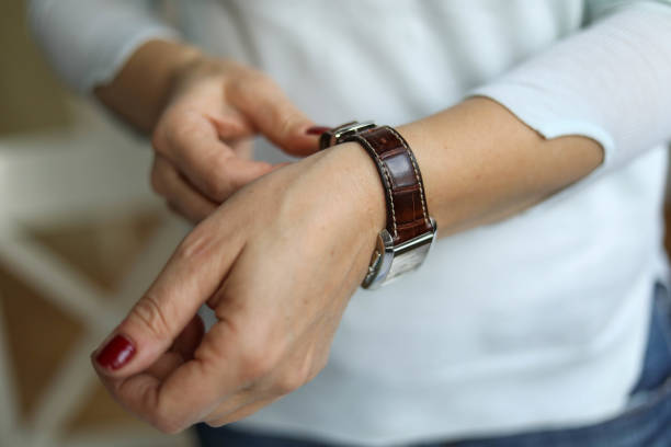 istock a wristwatch on a woman's hand, up close 1280965859