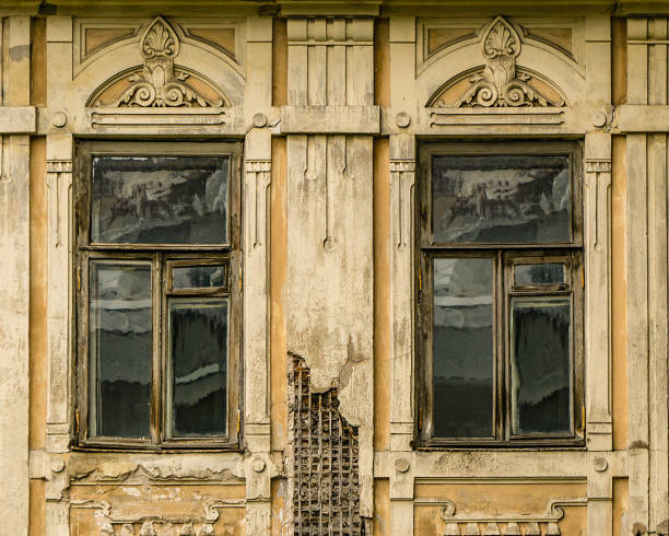 Window facade fragment of an abandoned old house. stock photo