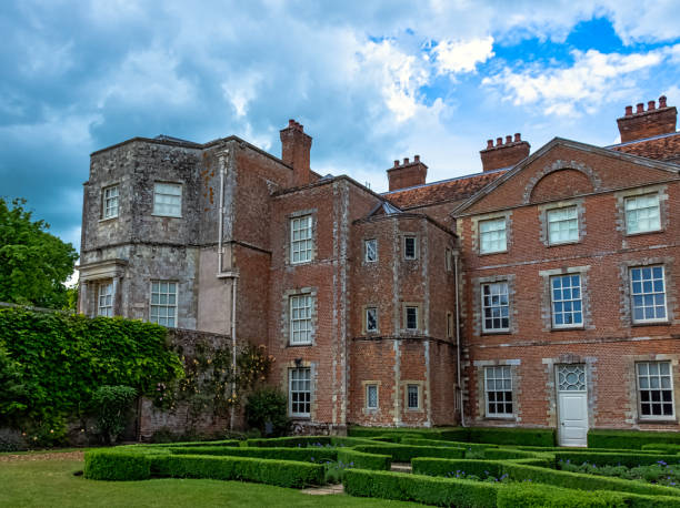 Mottisfont Abbey - a historical priory and country estate in Mottisfont, Hampshire, United Kingdom Mottisfont, Hampshire, United Kingdom -June 9, 2019: Mottisfont Abbey - a historical priory and country estate mottisfont stock pictures, royalty-free photos & images