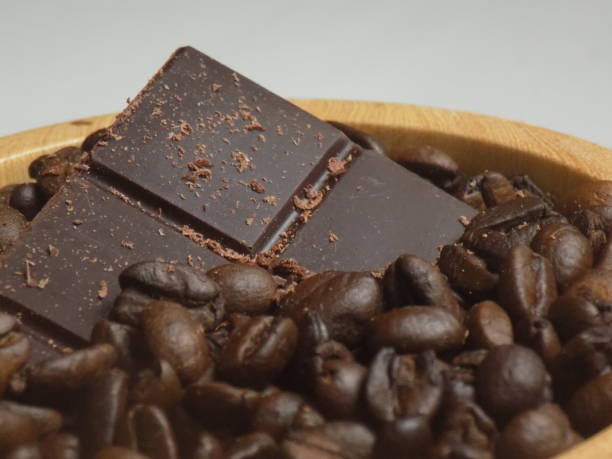 Chocolate bar between roasted coffee beans V