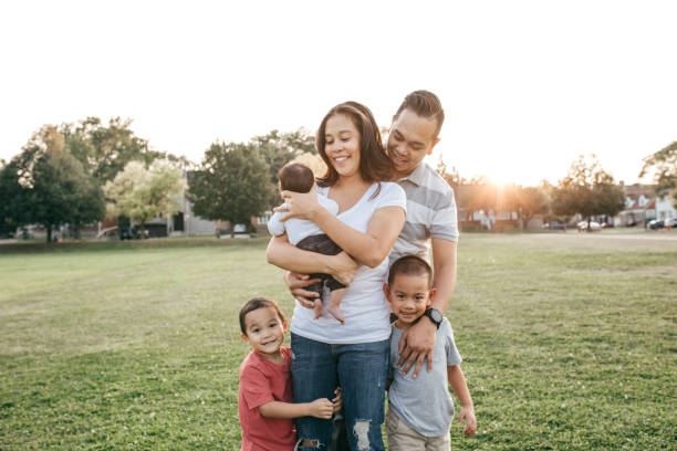 istock Family with three kids having fun 1280973250