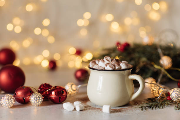 istock Mug for mockup near christmas tree and gift boxes 1280973725