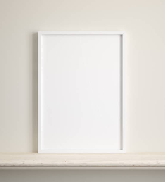 istock Mockup poster frame close up on shelf near beige wall 1280977362
