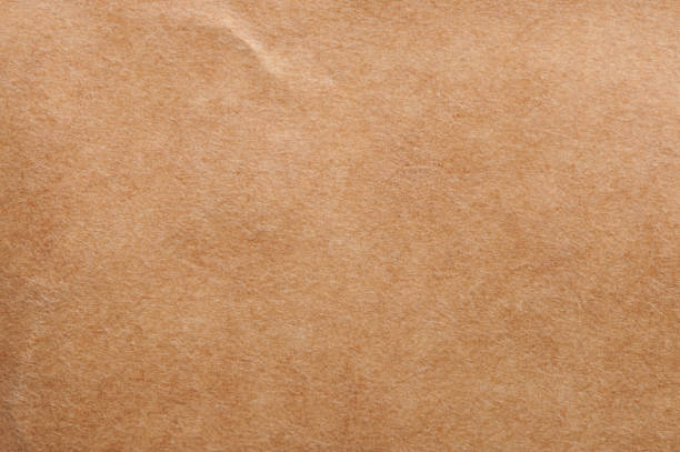 istock Surface of brown blank paper 1280979194