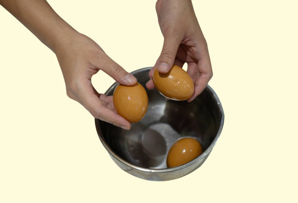 istock Boiled egg was being shelled  by the woman's hand. 1280980921